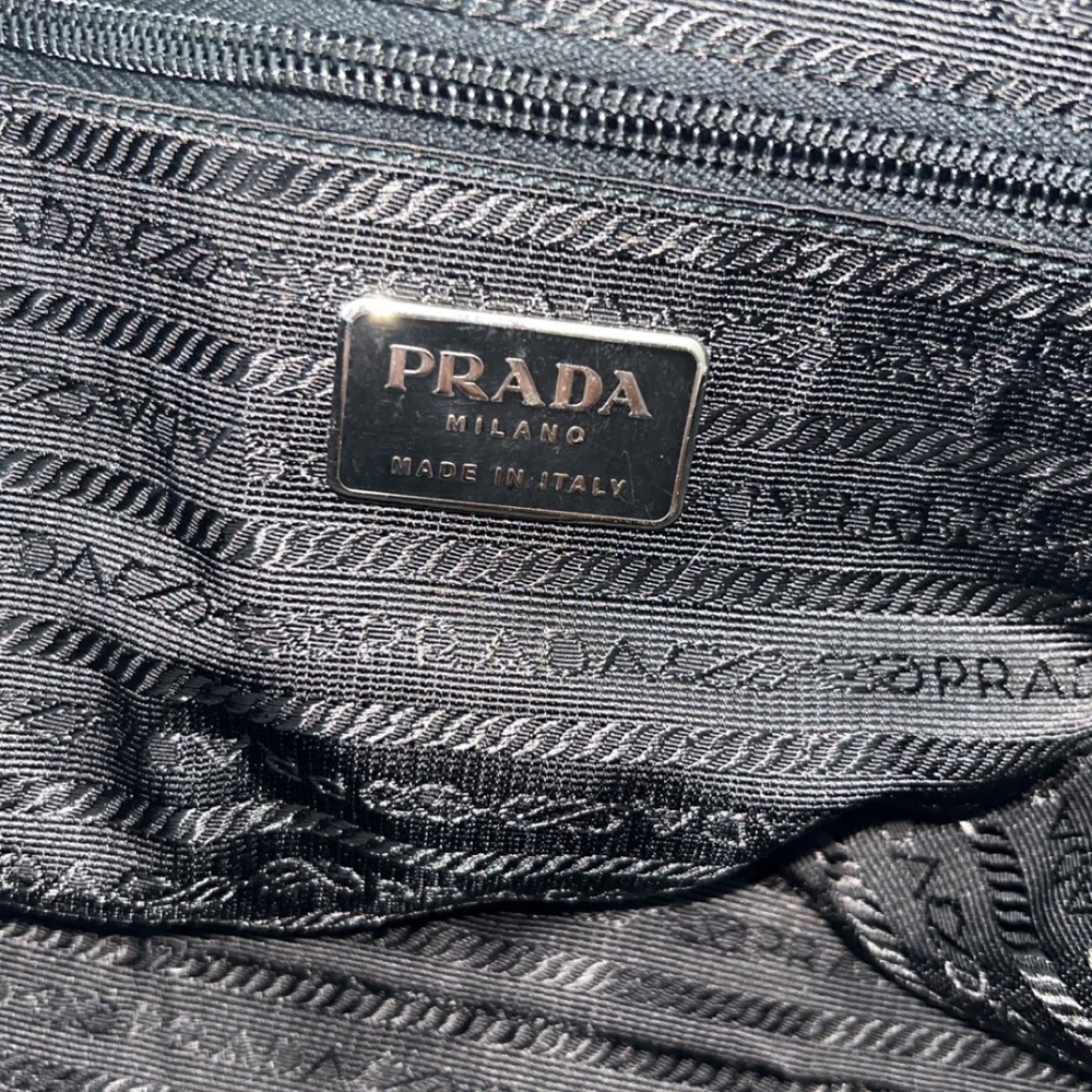 Beautiful black authentic nylon Prada. Has certification cards. Great condition